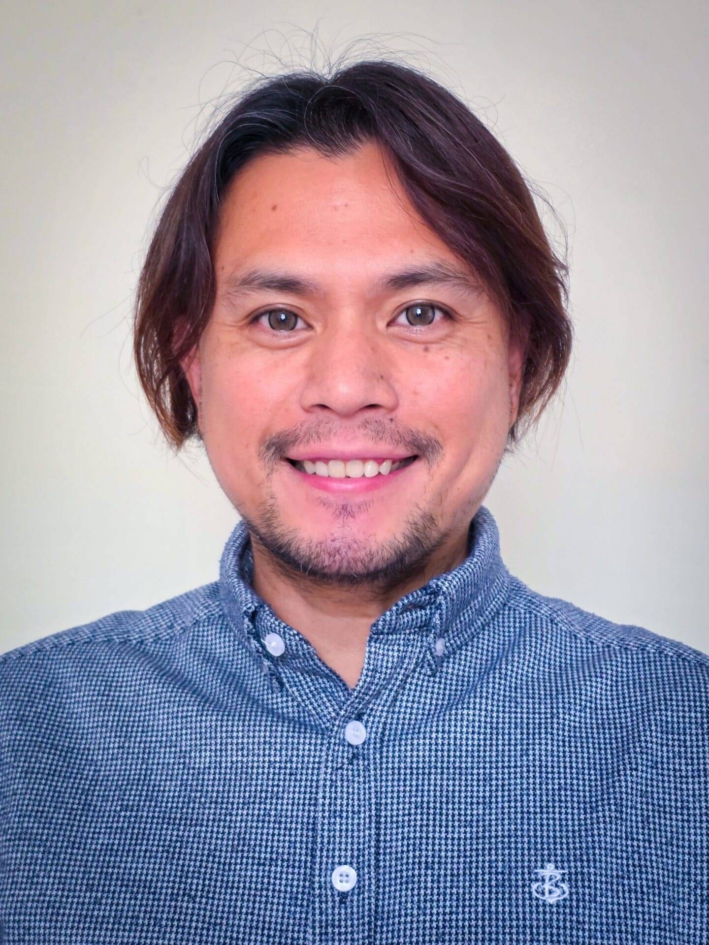 Anonymous Review symbol (purple silhouette of non-gendered person)