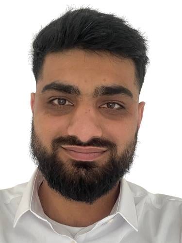 Professional headshot of Abdul Gatrad, Marketing Manager at the Purple House Clinic