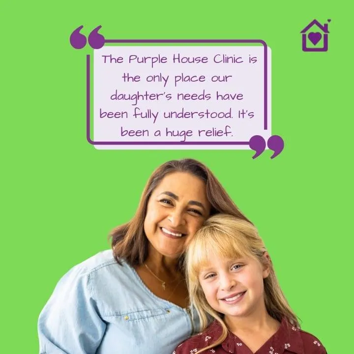Mother and daughter with a message about Purple House Clinic’s support