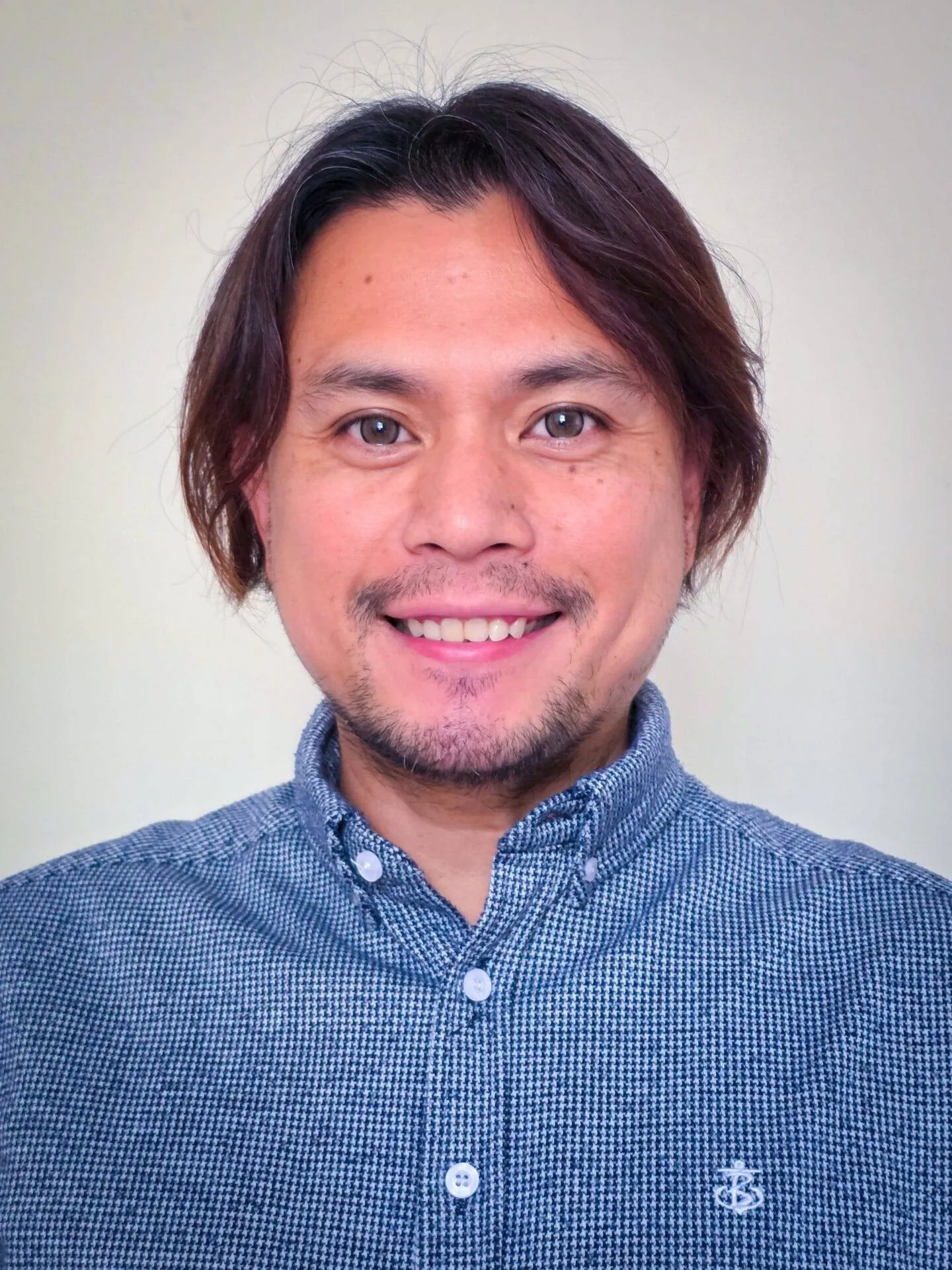 Anonymous Review symbol (purple silhouette of non-gendered person)